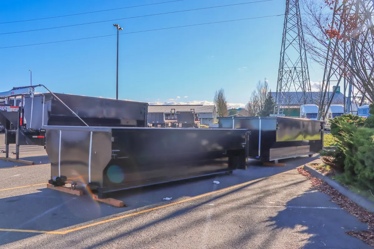 Roll-off dumpster ready for waste disposal at job site for Construction Dumpster Rental in North Druid Hills